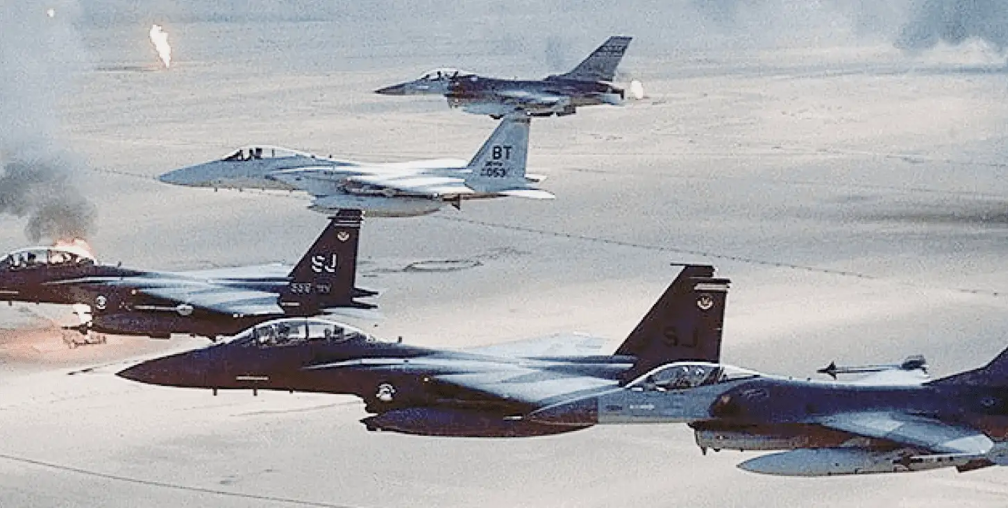 Several fighter jets flying through the air