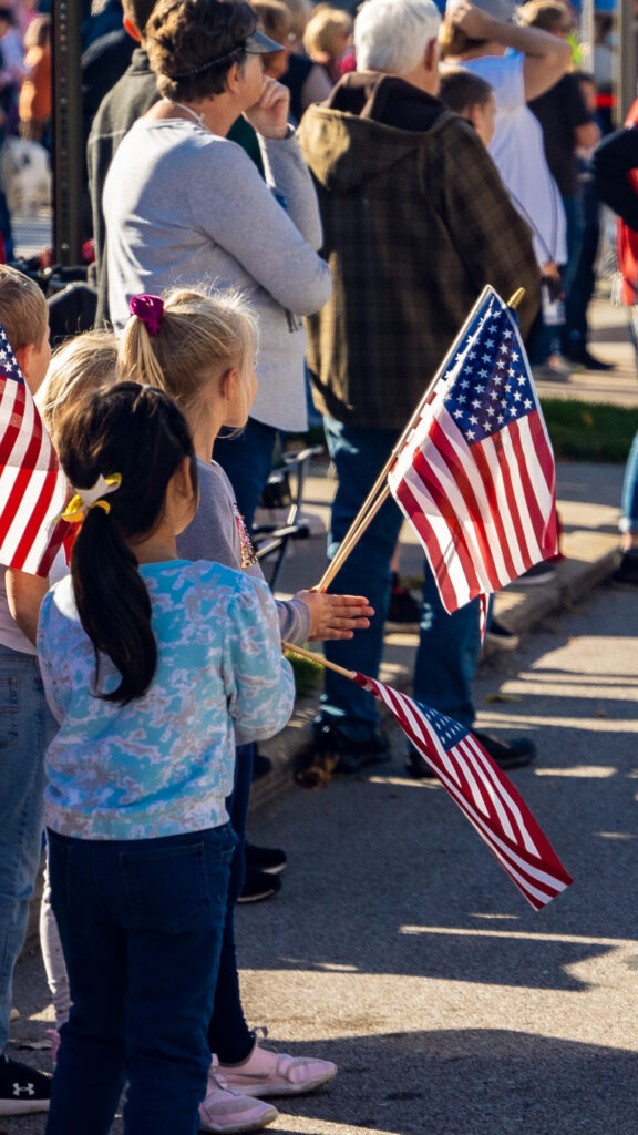 Kids Veterans parade USA Flags